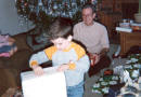 Brian Opening Presents with his Grandpa Hawkes